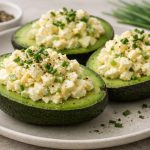 Creamy egg salad packed into ripe avocado halves for a rich, low-carb meal that’s quick, filling, and easy to portion.