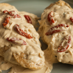 Pan-seared chicken coated in a thick, creamy sauce with sun-dried tomatoes and herbs.